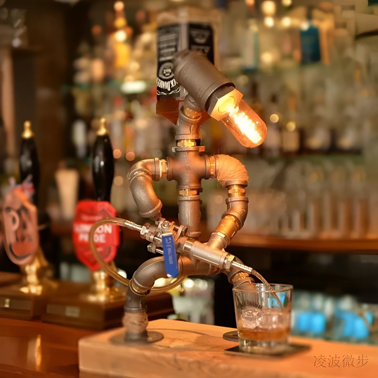 Industrial retro style iron pipe table lamp with water pipe robot design on a desk.