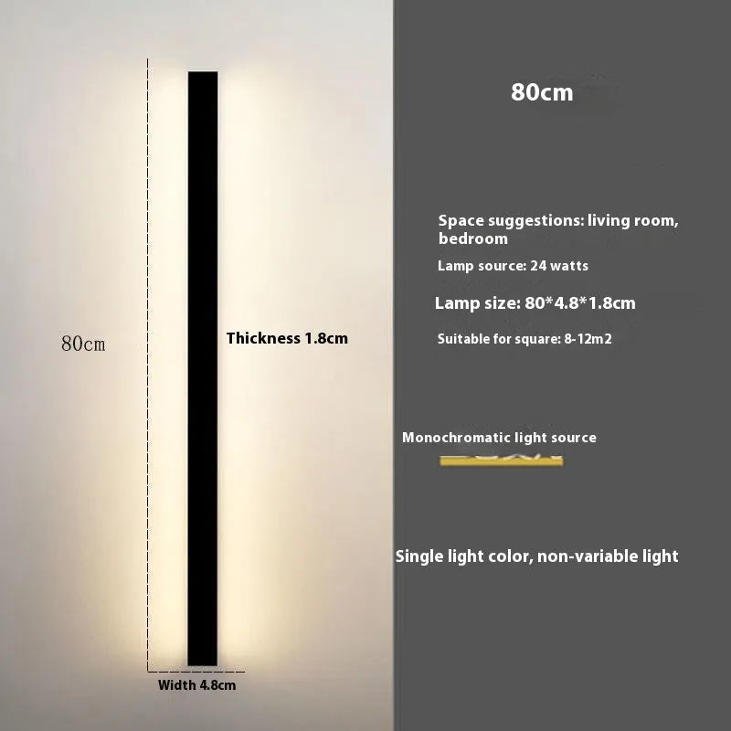 Black minimalist bedside wall lamp in 40cm to 200cm lengths with three light colour options on a wall
