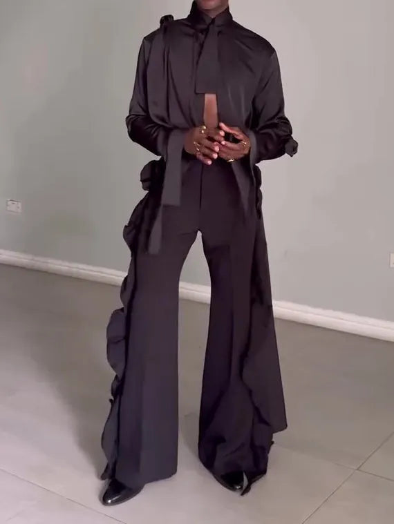 Men's black hollow cut out shirt and high waist pants suit set on display, polyester fabric, regular fit