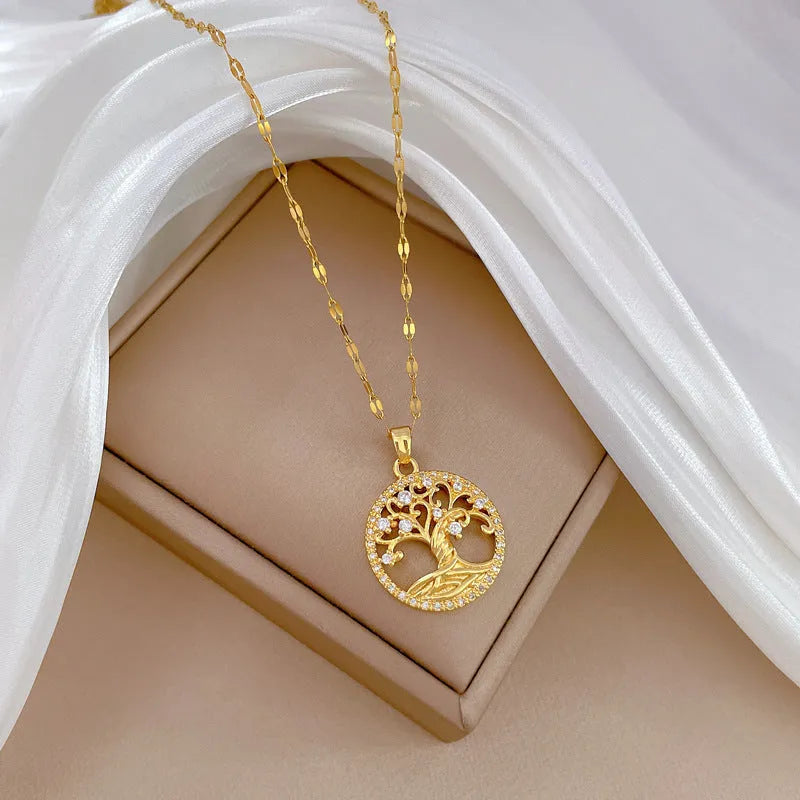 Gold plated adjustable necklace with mother-of-pearl cross pendant set with sparkling zircon stones on a lip chain.