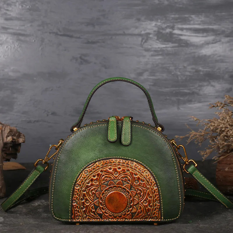 Vintage suede cowhide leather handbag with multiple interior pockets including ID and phone slots.