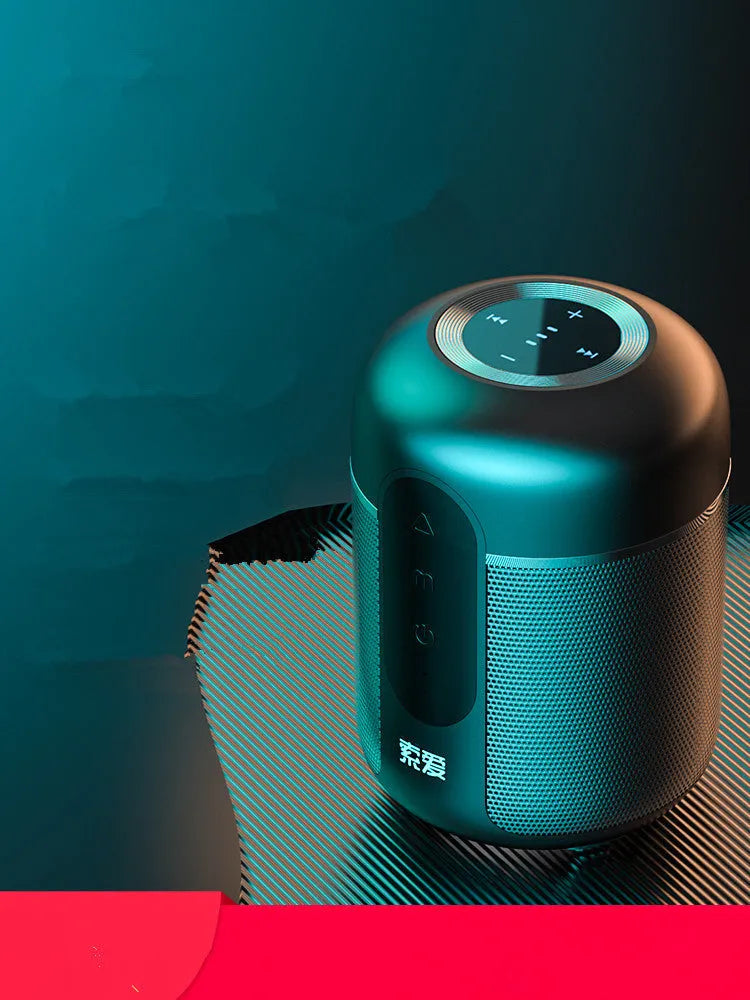 Black portable Bluetooth speaker with plastic cabinet, measuring 72mm by 99mm