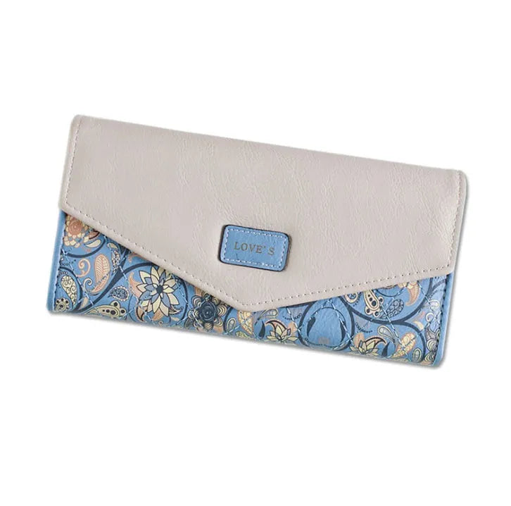 Women's large capacity three-fold PU leather student wallet with buckle closure in multiple colours.