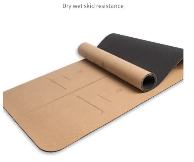 Cork yoga mat 183cm x 66cm x 6mm with black cork surface and TPE bottom layer.