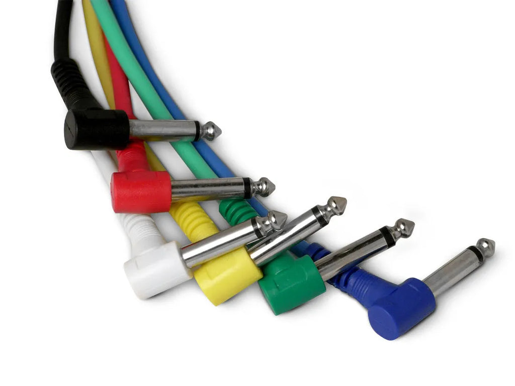 Set of six coloured electric guitar effector cables for effects pedals and audio connections