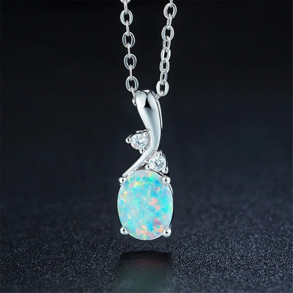 Water drop shaped opal pendant necklace with adjustable O-chain in white gold finish