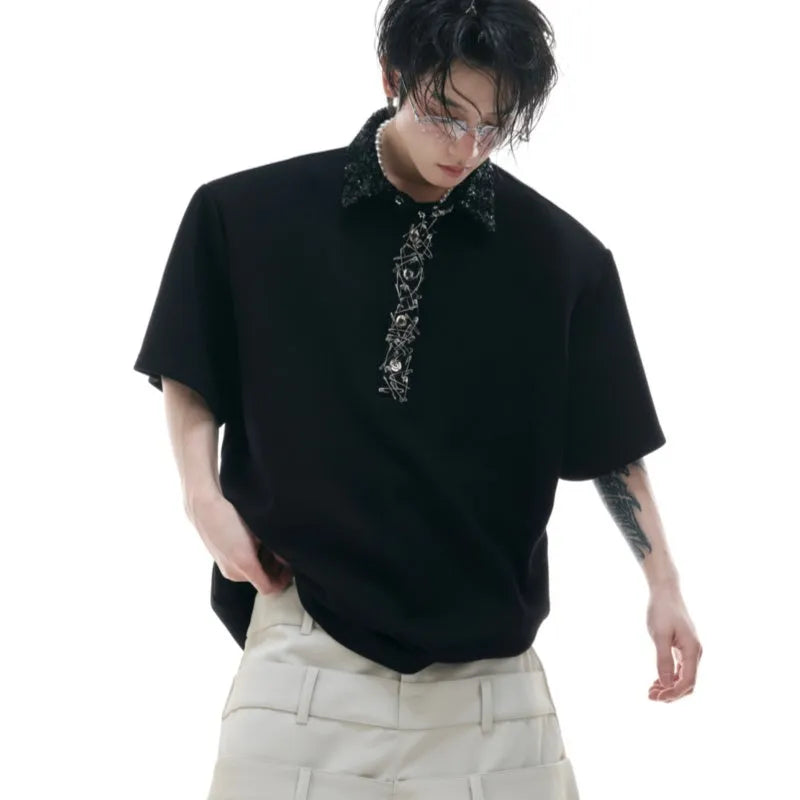 Men's black loose fit polo t-shirt with square collar and heavy embroidery sequin detail on chest