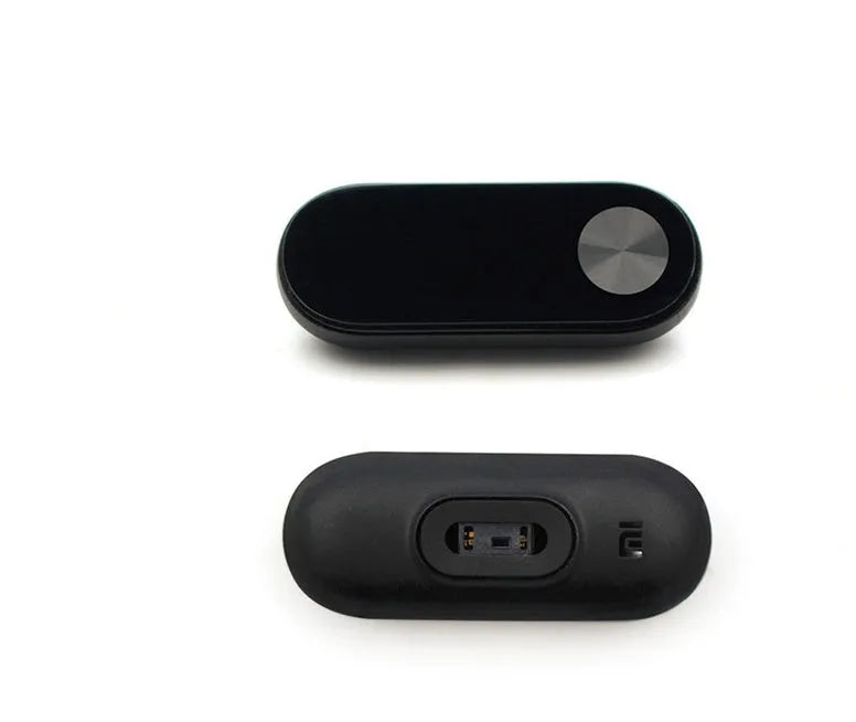 Xiaomi Mi Band 2 black smart band with OLED screen on an adjustable grey wrist strap.