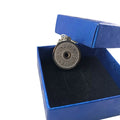 Stainless steel geometric barbell disk necklace on a 60cm chain, showing polished pendant detail.