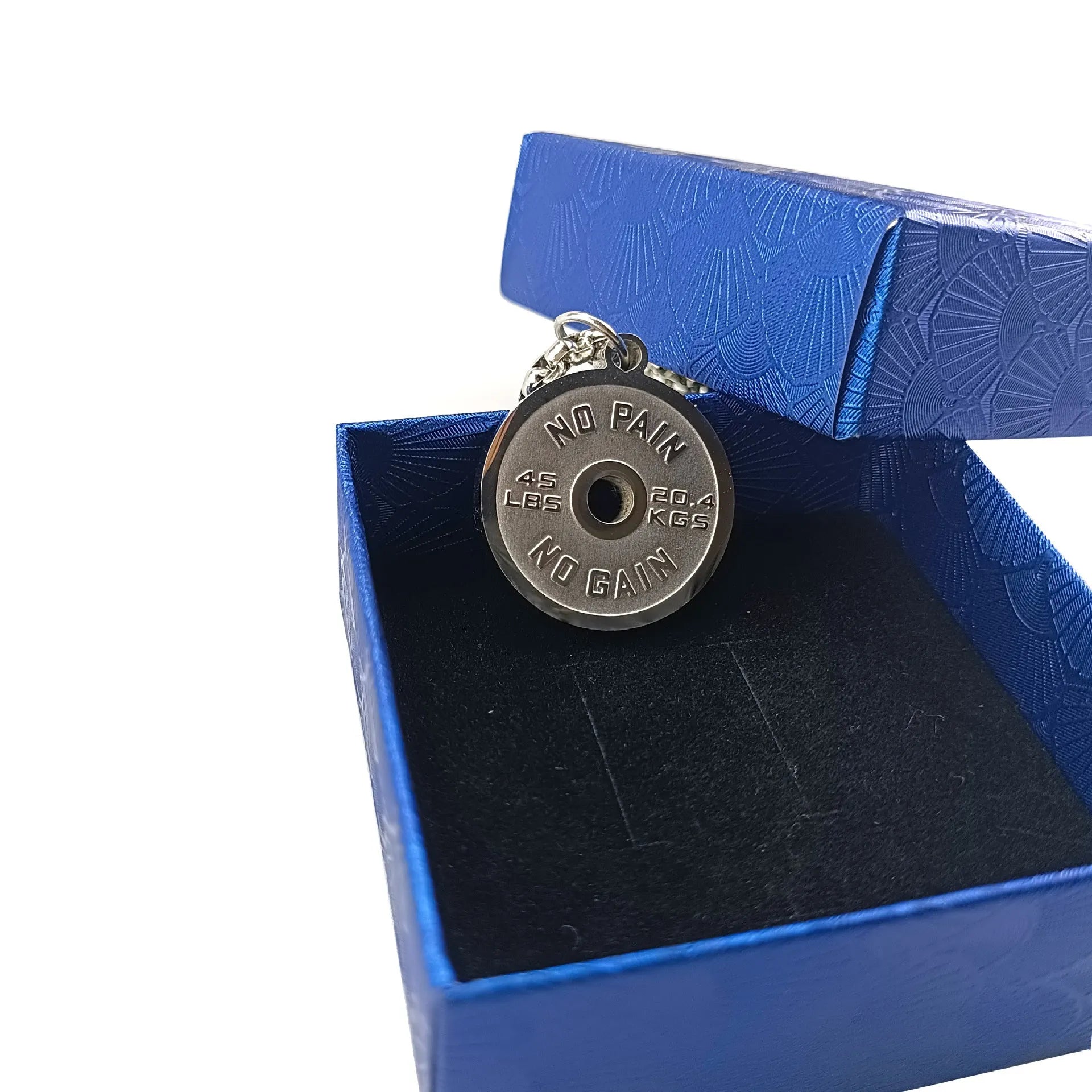 Stainless steel geometric barbell disk necklace on a 60cm chain, showing polished pendant detail.