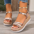 Gold women's wedge sandals with woven upper and round toe