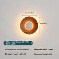 Round aluminium wall lamp with LED light in a white and gold colour option.