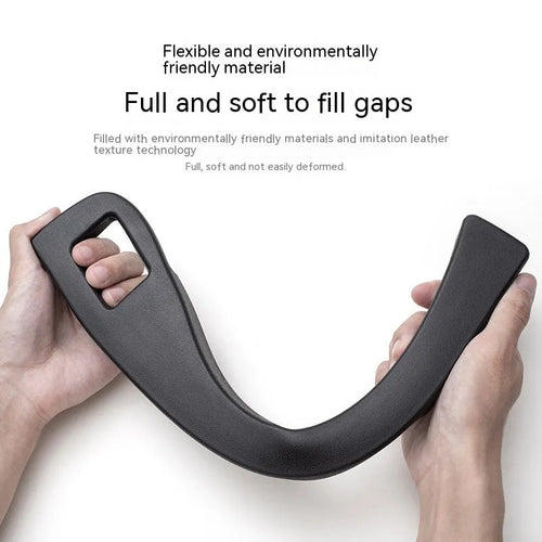 Black plastic car seat gap storage box with handle between vehicle seats