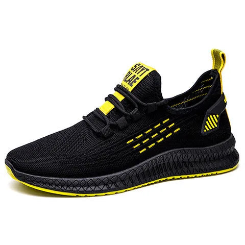 Men's black casual sports shoes with flying three bars stripe pattern and cross strap details on a white background.