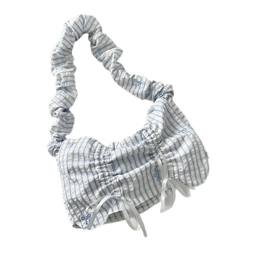 Women's soft polyester pleated flip shoulder bag with bow detail in blue plaid colour