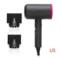 2000W hotel hair dryer in metallic black with a long cable, showing UK plug model.