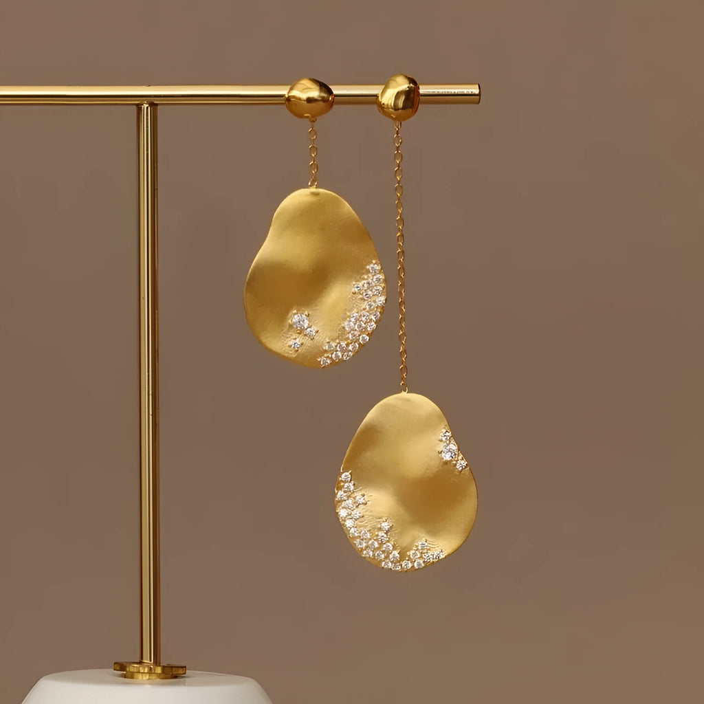 Gold plated asymmetric floral earrings with zircon mosaic detailing in Chinese style design