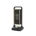 Black PTC ceramic desktop air heater with control knob on a flat surface.