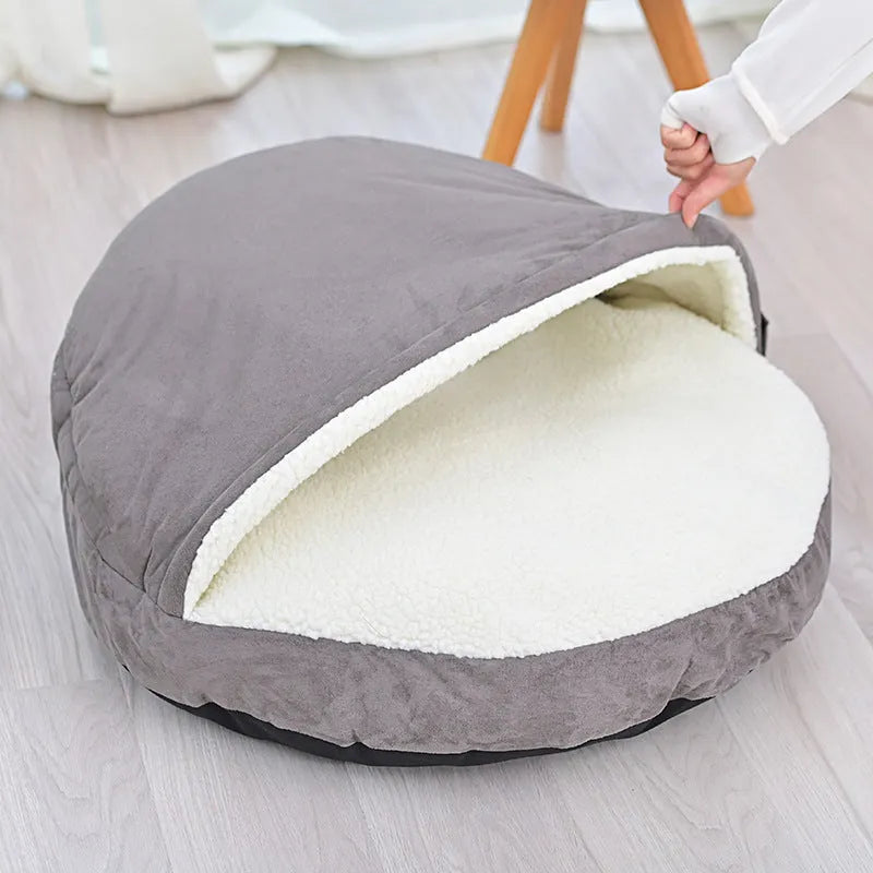 Brown removable cloth dog kennel bed with washable cover shown in a home setting.