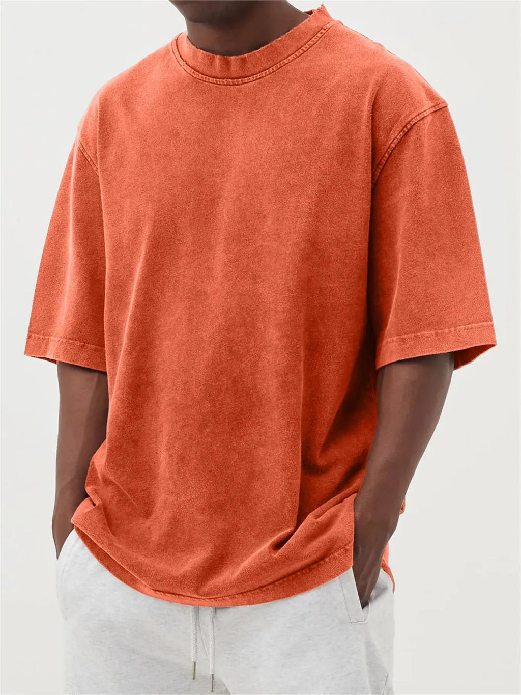 Men's stone-washed polyester t-shirt in loose fit with half sleeves and distressed finish