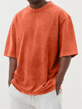 Men's stone-washed polyester t-shirt in loose fit with half sleeves and distressed finish