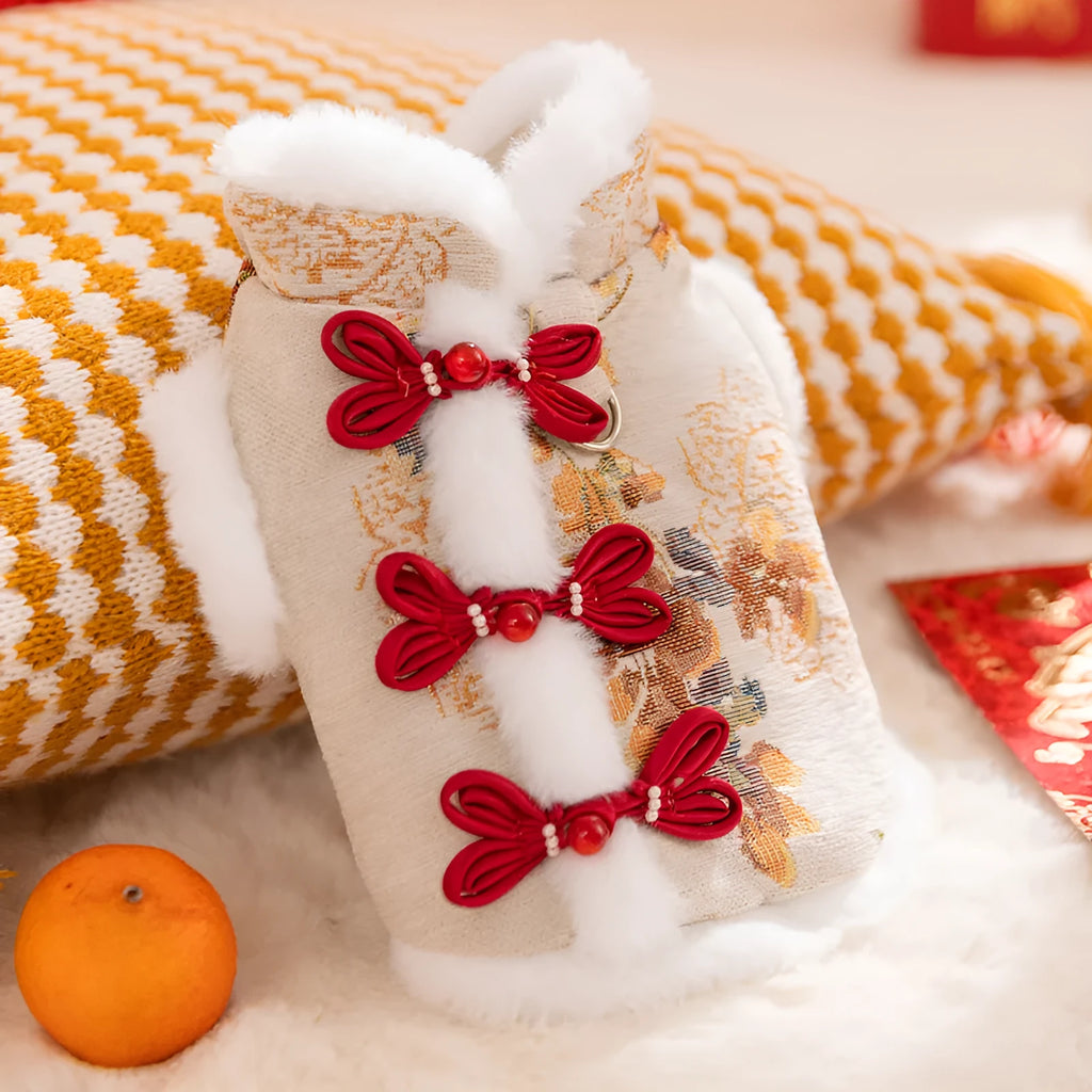Chinese New Year pet vest with Chinese knot buttons, faux fur trim, and built-in leash ring in red or beige