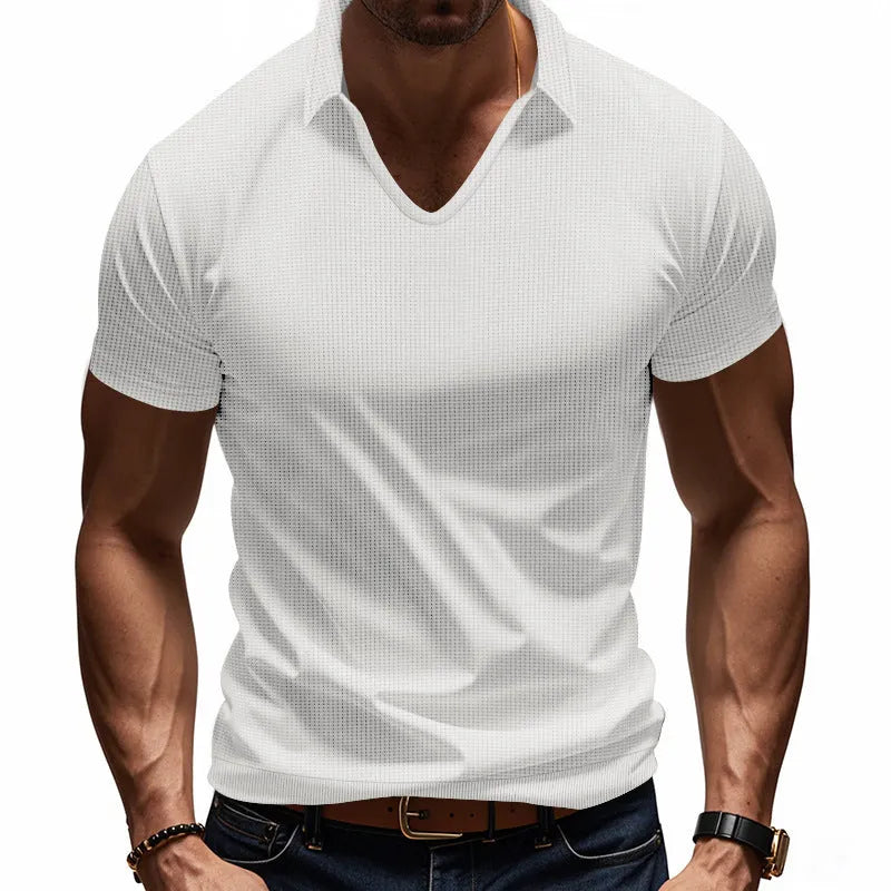 Men's loose fit light grey cotton blend V-neck short sleeve t-shirt laid flat.