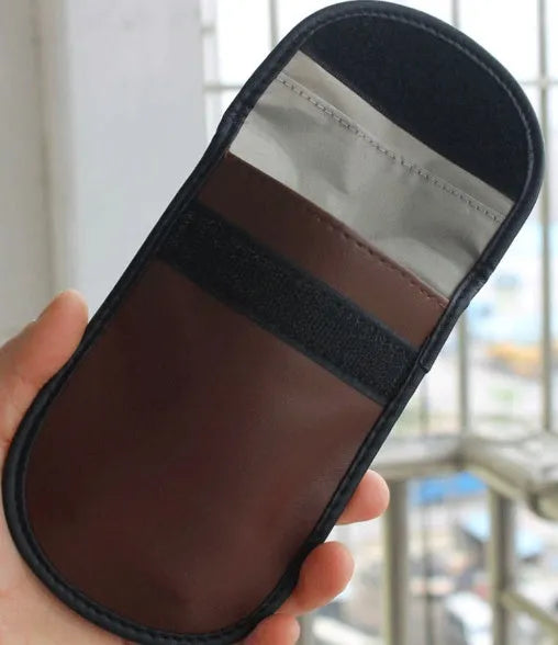 Black microfiber RFID blocking pouch for car keys and cards measuring 13.5 by 9.5 centimetres.