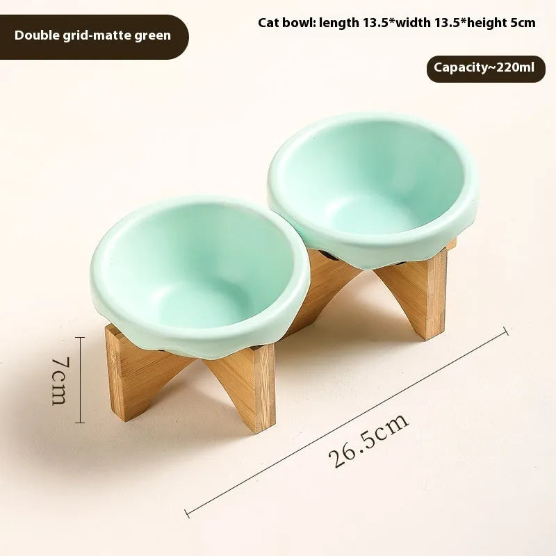 Porcelain cat drinking water bowl in bright red single grid configuration on surface