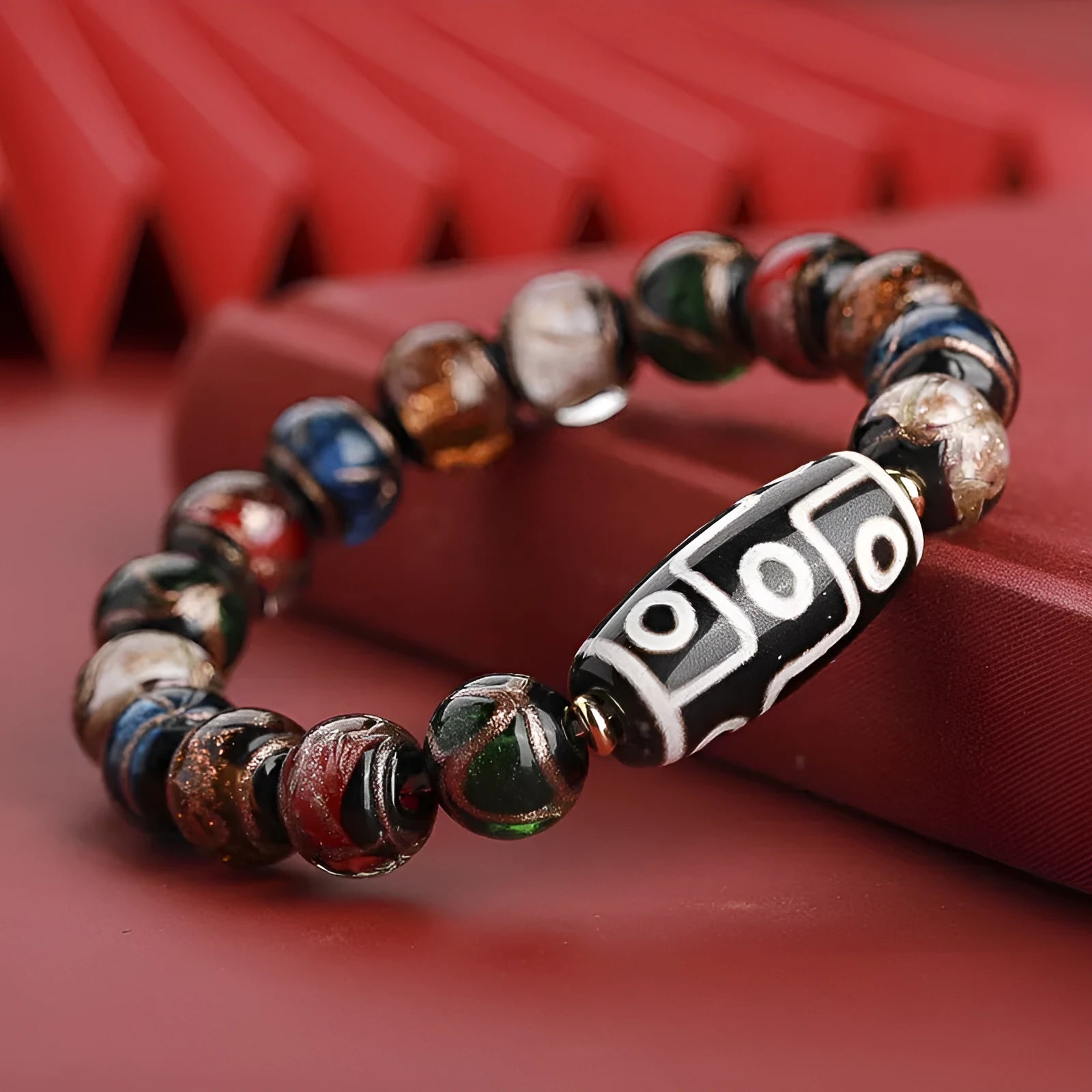 Handcrafted five-colour Chinese lucky bracelet with snake beads on wrist, showing coloured glaze in 10mm, 12mm, 14mm sizes.