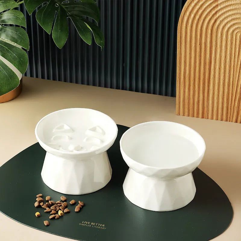 Ceramic tall cat bowl in neutral colour with raised design to protect spine during feeding