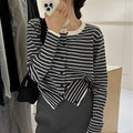 Dark grey and white striped women's cardigan coat with long sleeves and a short, slim fit.