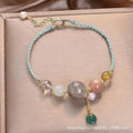 Hand-woven crystal peace buckle bracelet with sequin detailing in red, green, or blue colour options
