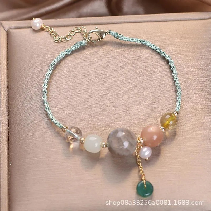 Hand-woven crystal peace buckle bracelet with sequin detailing in red, green, or blue colour options
