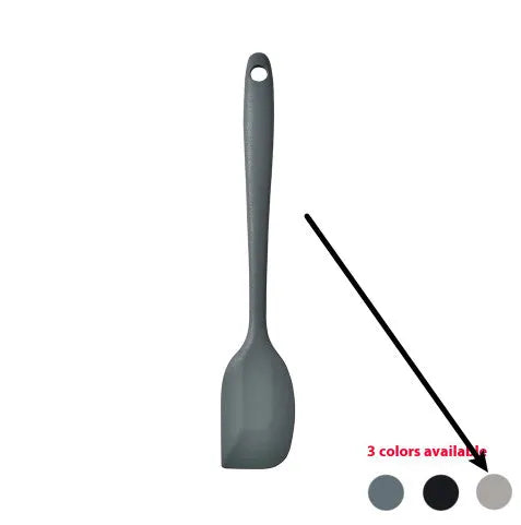 Black silicone kitchen utensil set with 12 tools stored in a rotating plastic storage bucket on a worktop.