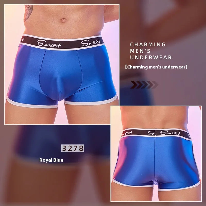 Men's nylon boxers in black, sapphire blue, and white colours, showing silky fabric texture.