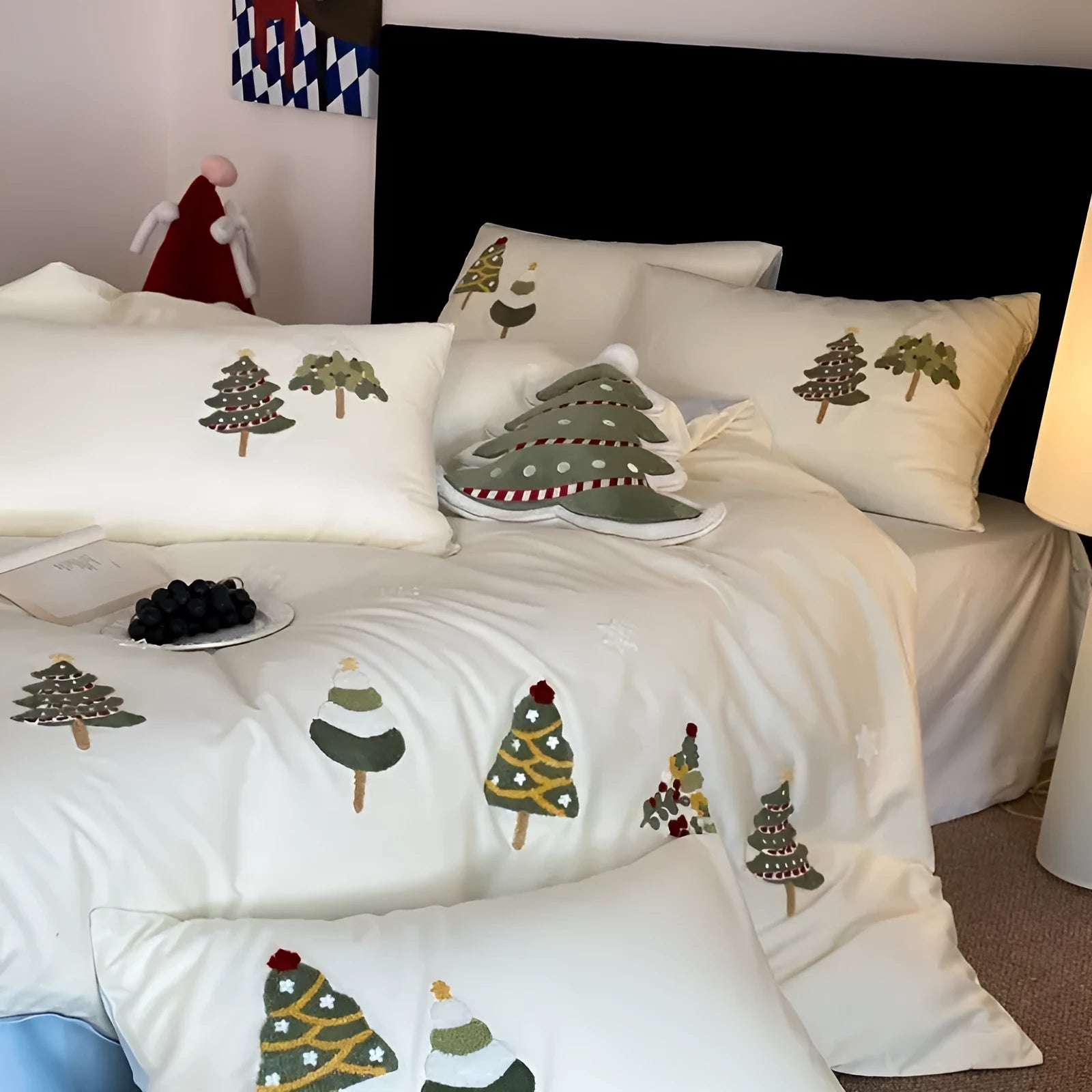 Cream blue duvet cover with embroidered Christmas tree and towel motif, part of a 100% cotton four-piece bedding set.