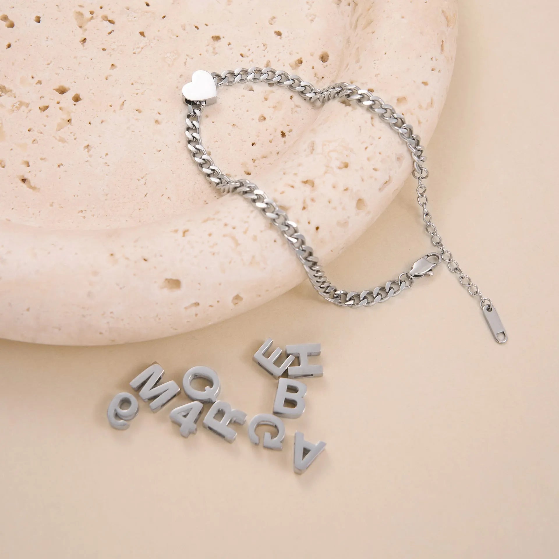 Gold titanium steel necklace with a letter A pendant on a 40.5cm chain.