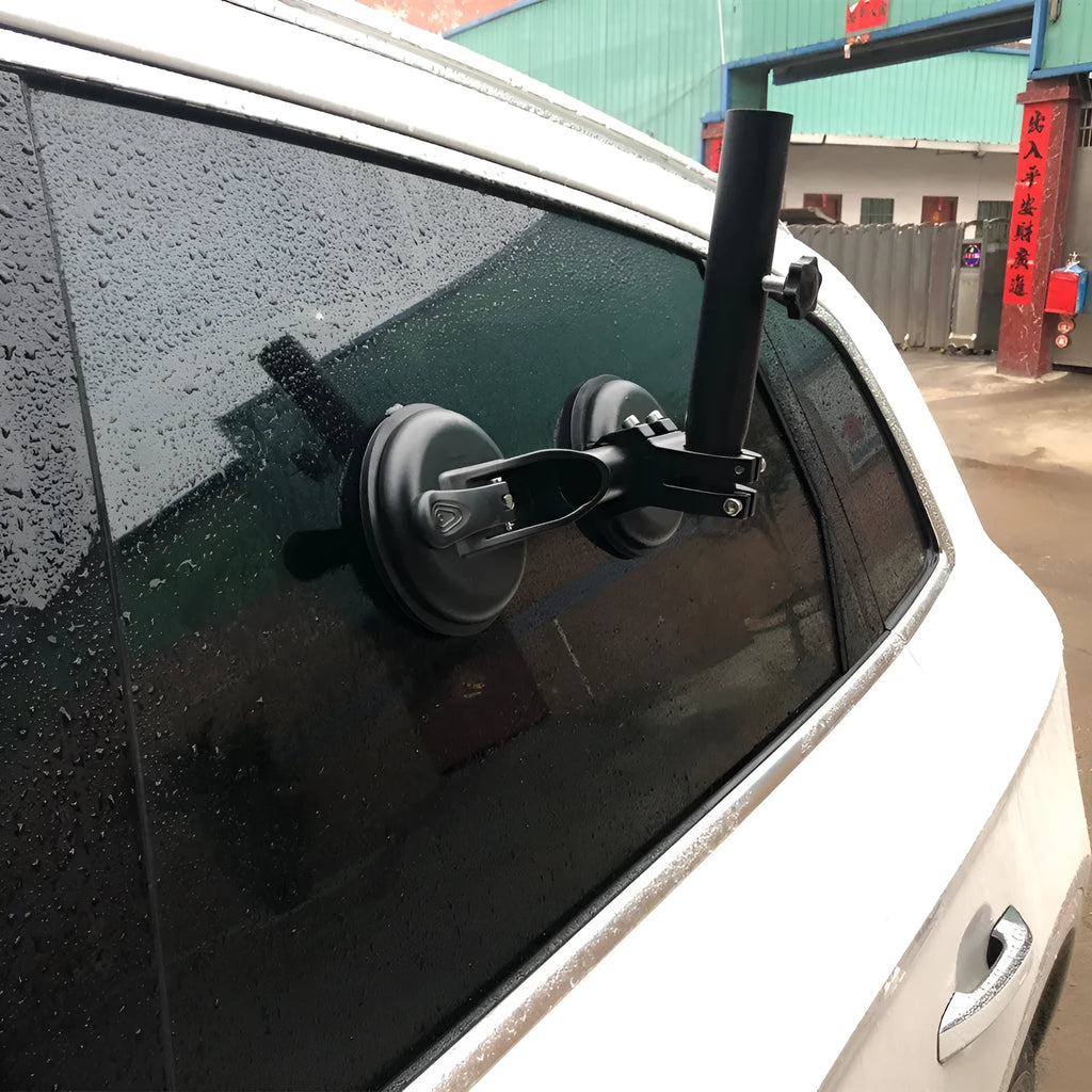 Black off-road car glass sucker base with round rubber disc for windscreen mounting.