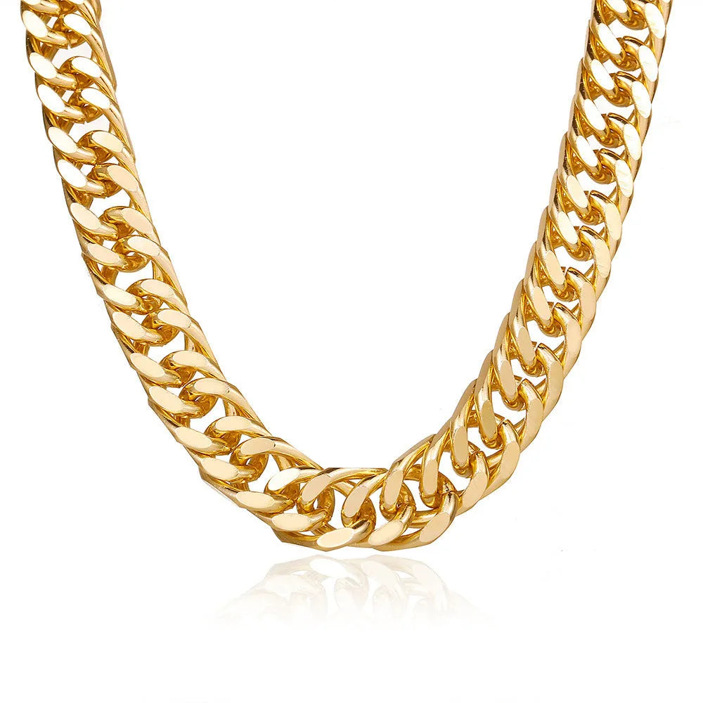 Gold women's thick link chain necklace with a 6cm drop pendant on a model.