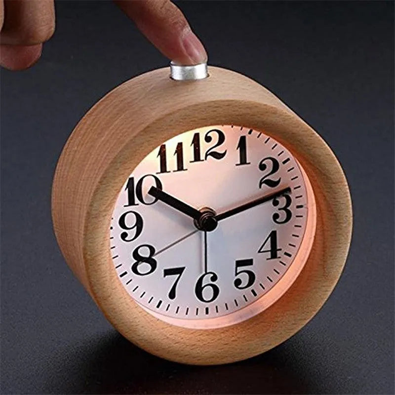 Solid beech wood analogue alarm clock with a white dial and small mirror.