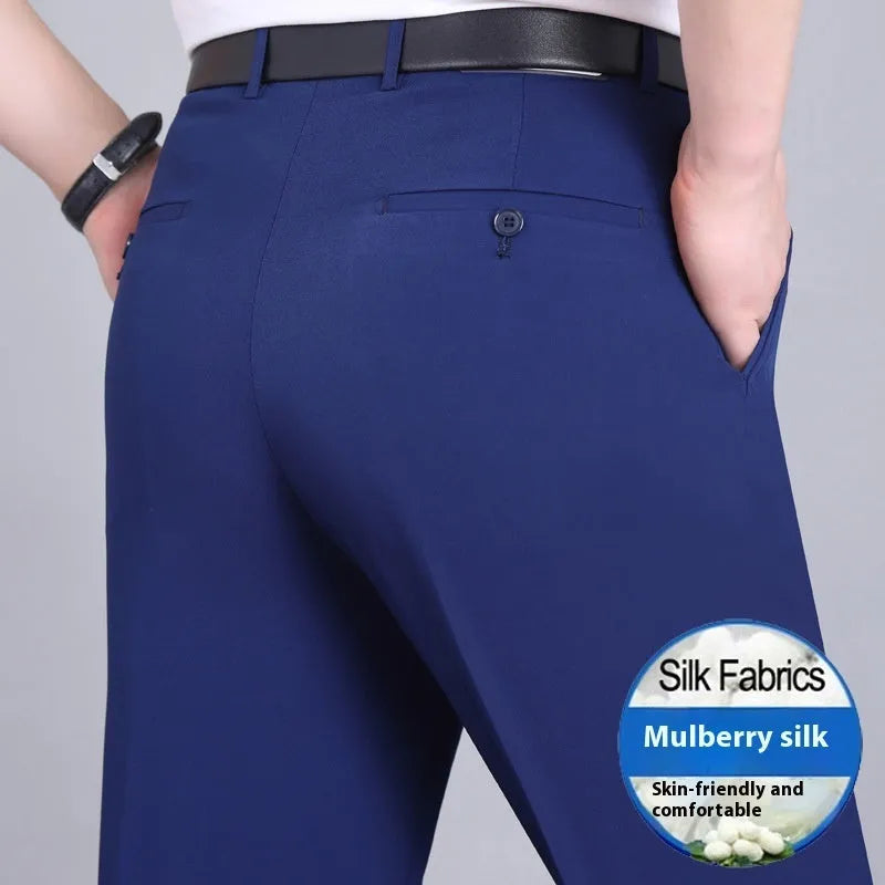 Men's straight-leg mulberry silk blend business trousers in dark blue on a hanger.