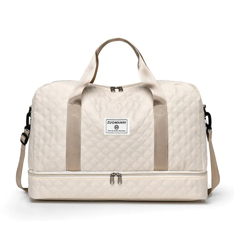 Large Oxford cloth travel bag in a solid colour showing its spacious design and street style details.