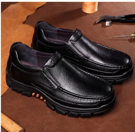 Men's black leather slip-on business casual shoes with a rubber sole, shown on a neutral background.