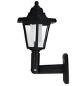 Black hexagonal solar-powered wall light with integrated solar panel and waterproof IP44 rating for outdoor use