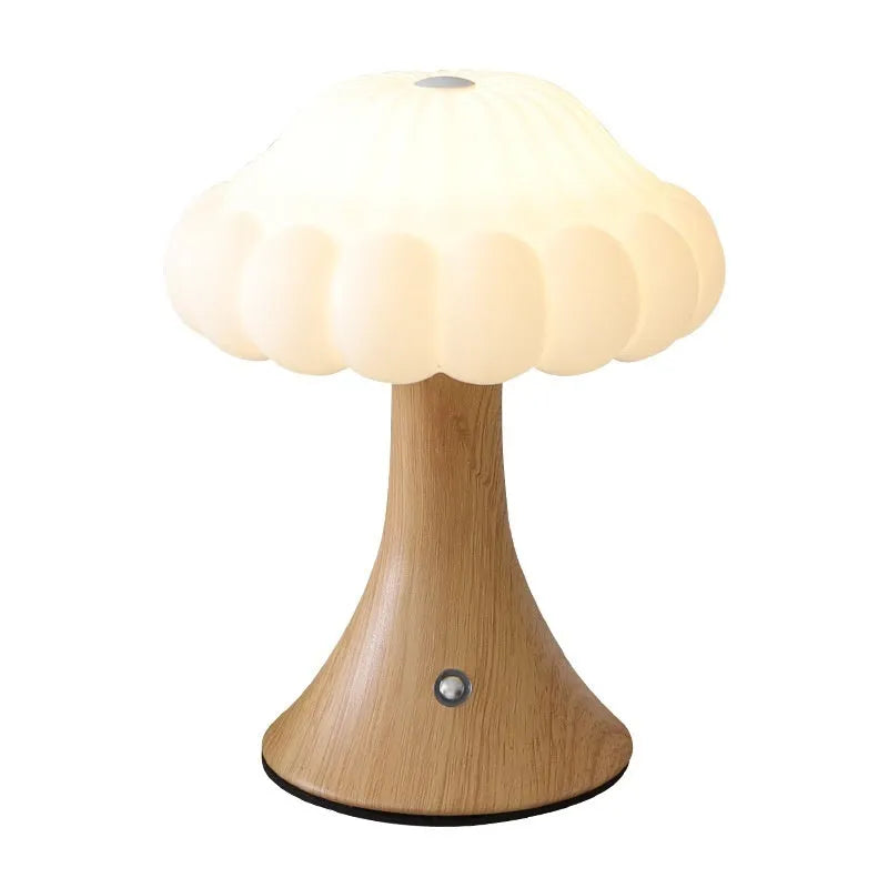 Small decorative mushroom-shaped night lamp in wood grain colour with touch control.