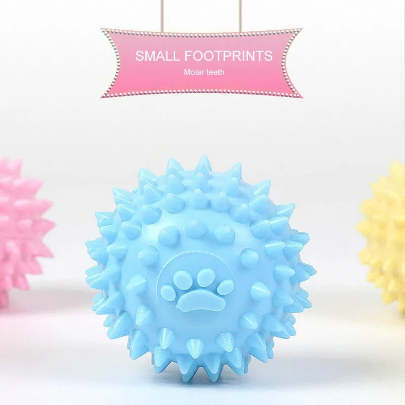 6cm TPR dog chewing ball with textured footprint surface in blue, pink and yellow colour options