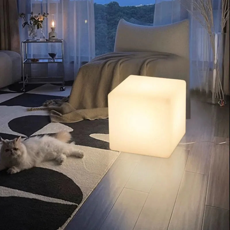 Square waterproof LED cube light stool in a modern style for outdoor garden use.