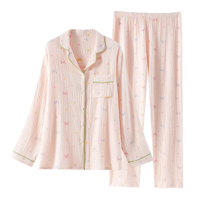Women's thin cotton long-sleeve pajama set in beige, showing top and trousers laid flat.