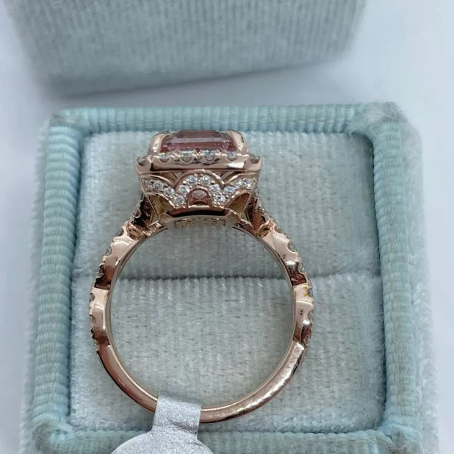 Women's rose gold electroplated alloy geometric ring shown in seven available sizes